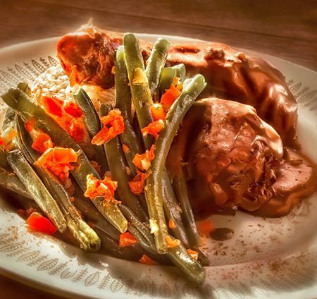 Recette sans gluten de Pilons de poulet en sauce épicée au chocolat